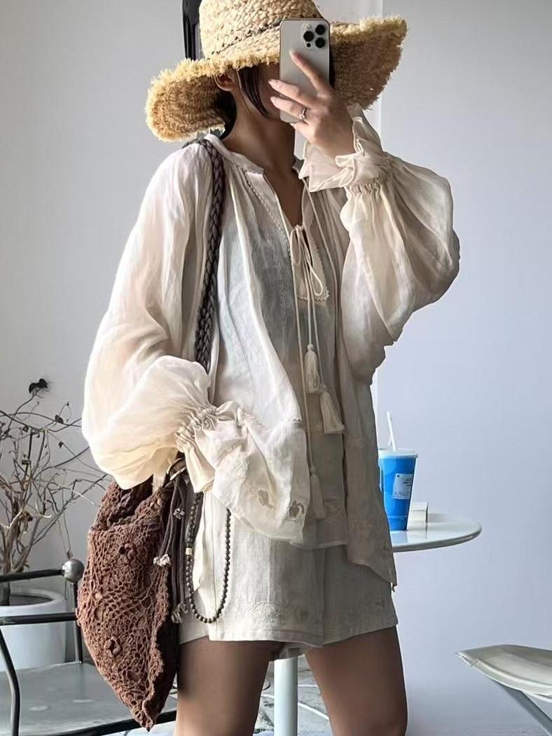 Tassel Tie Neck Long Sleeve Hem Floral Embroidered Slit Blouse